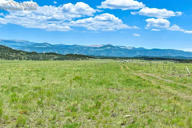 a view of lake and mountain