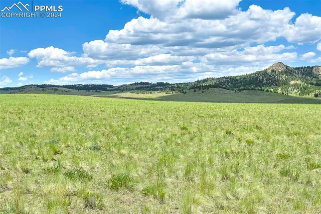 a view of an outdoor space and mountain view