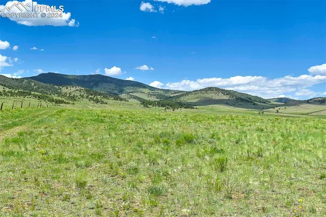 a view of a city with a mountain in the background