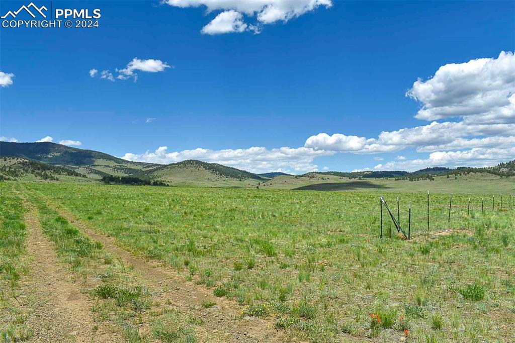 63 County Road Guffey, CO 80820 - Photo 6 of 35 a view of a lake from a yard