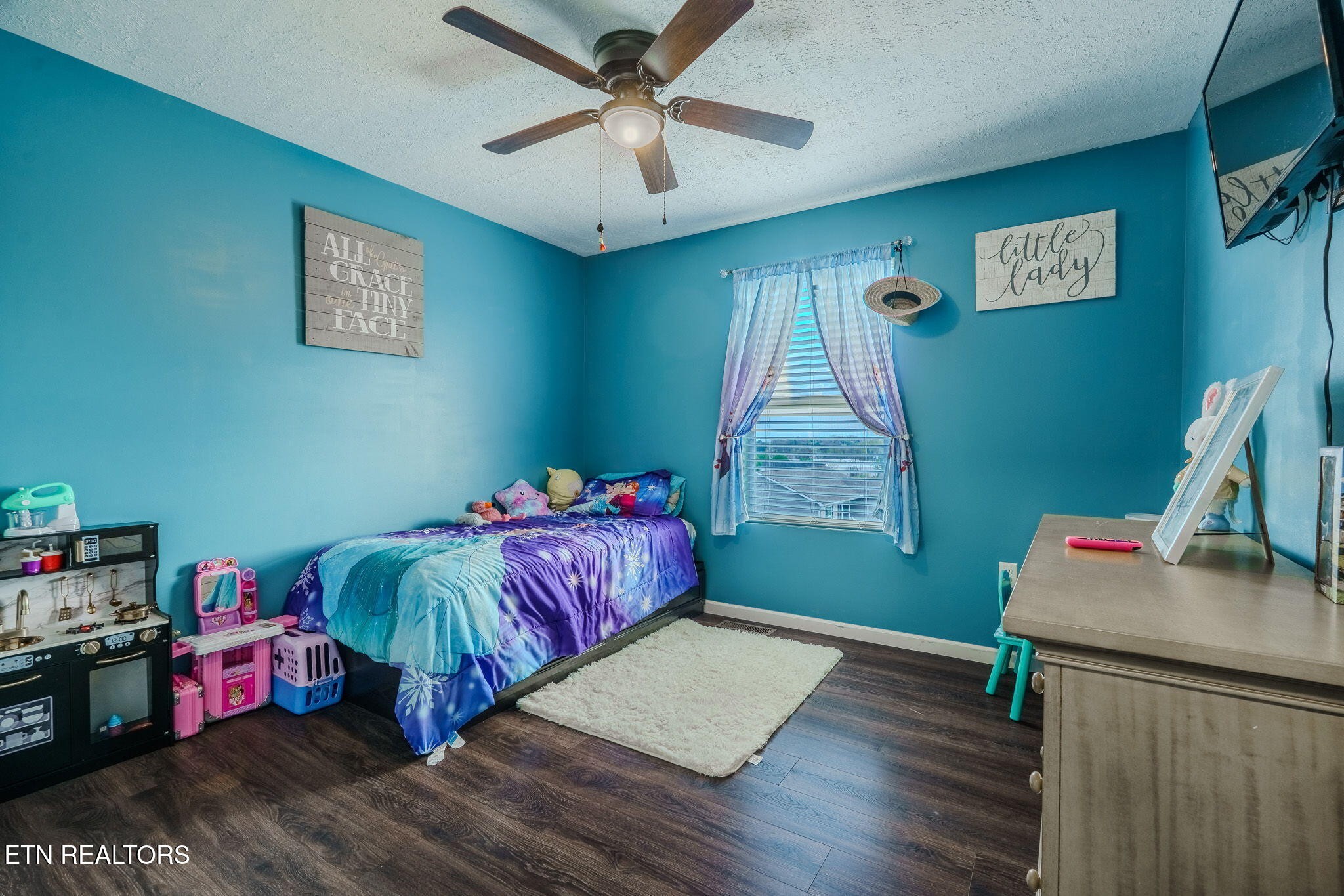 3215 Smith Road White Pine, TN 37890 - Photo 20 of 28 a bedroom with furniture and a wooden floor