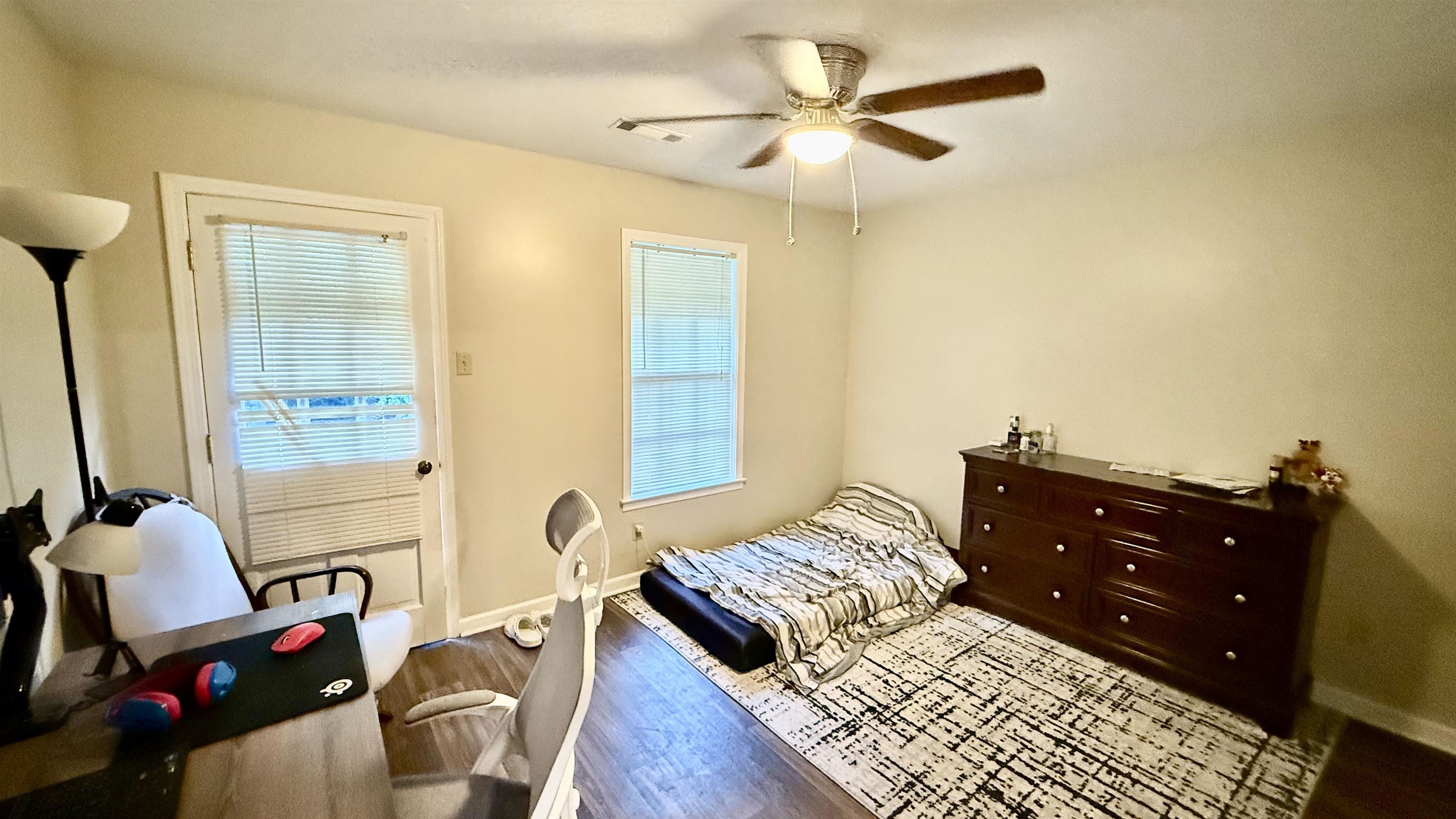 379 Dove Valley Road Collierville, TN 38017 - Photo 8 of 12 Bedroom featuring baseboards, wood finished floors, and ceiling fan