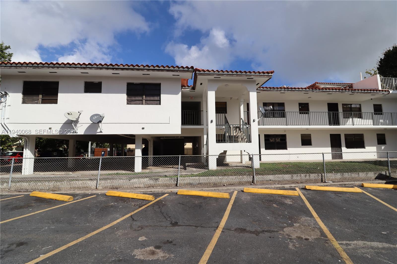 1348 Southwest 2nd Street, Unit 8 Miami, FL 33135 - Photo 21 of 37 a view of a house with pool