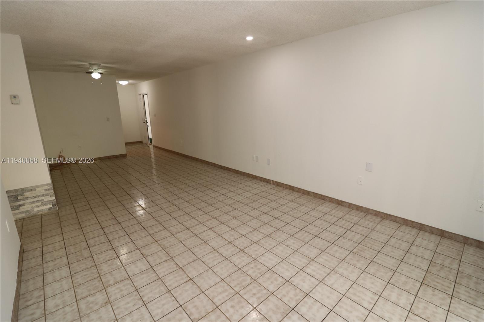 1348 Southwest 2nd Street, Unit 8 Miami, FL 33135 - Photo 22 of 37 an empty room and wooden floor