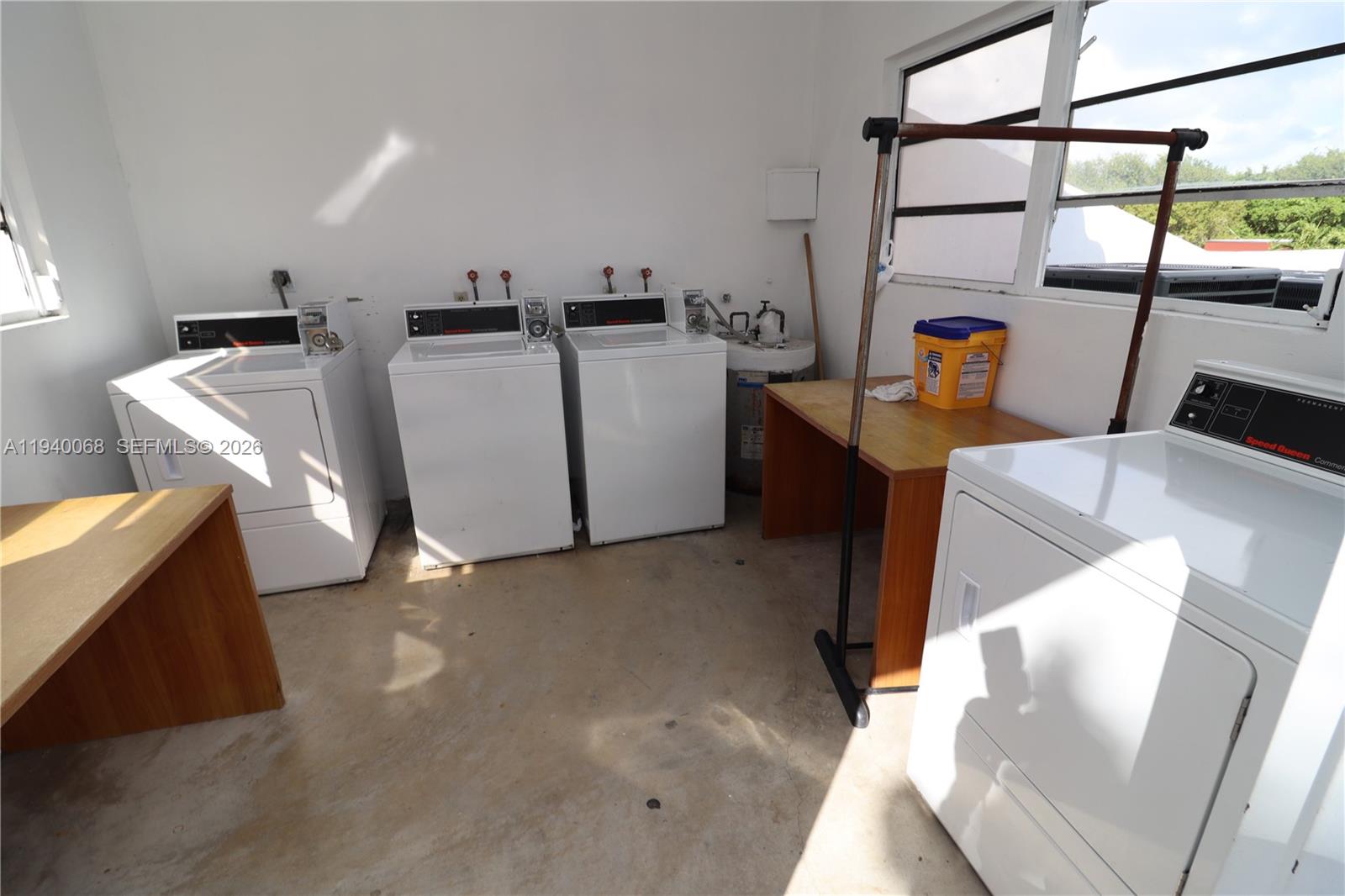 1348 Southwest 2nd Street, Unit 8 Miami, FL 33135 - Photo 25 of 37 a utility room with dryer and washer