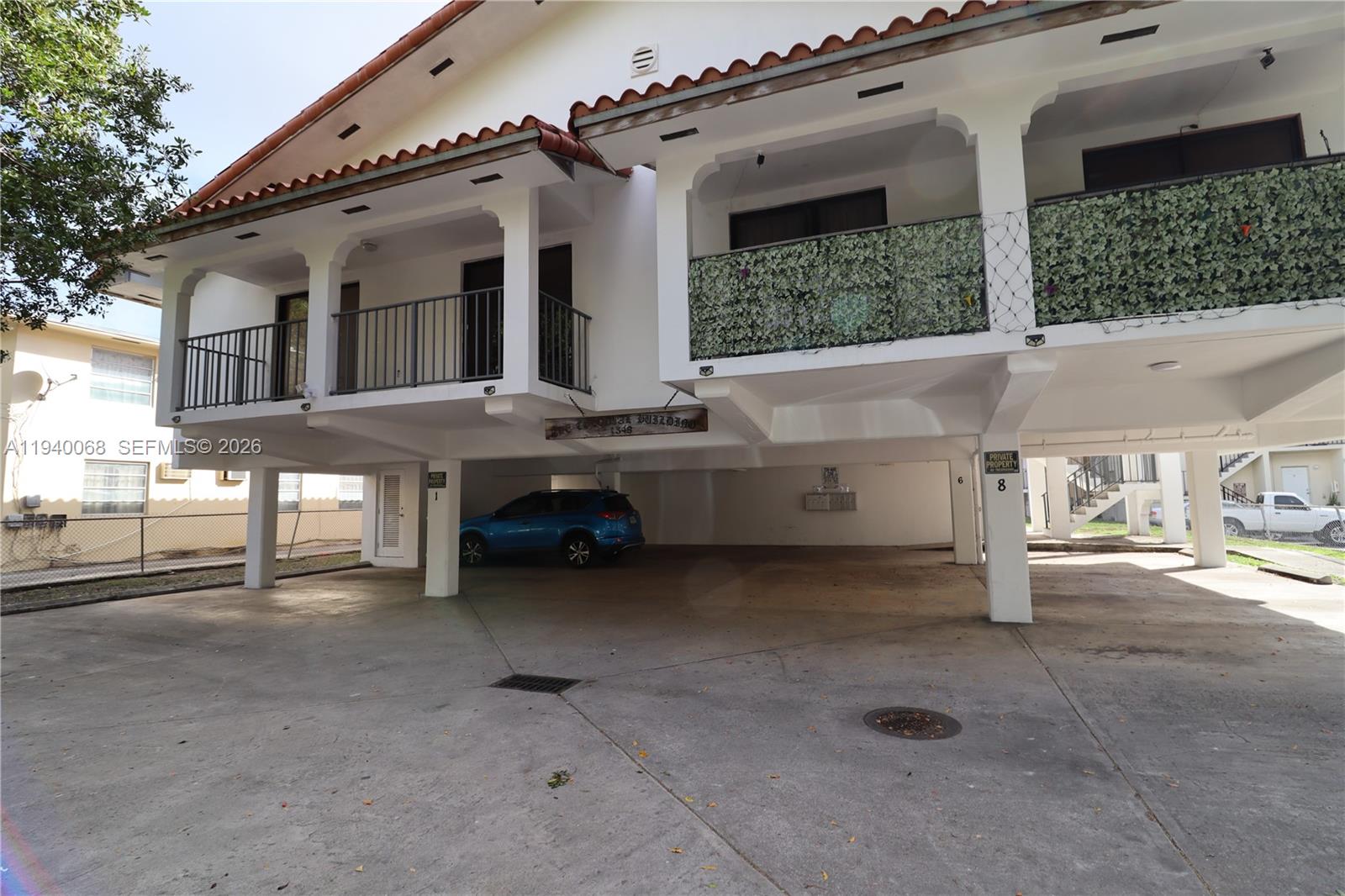 1348 Southwest 2nd Street, Unit 8 Miami, FL 33135 - Photo 27 of 37 an outdoor view of house with yard