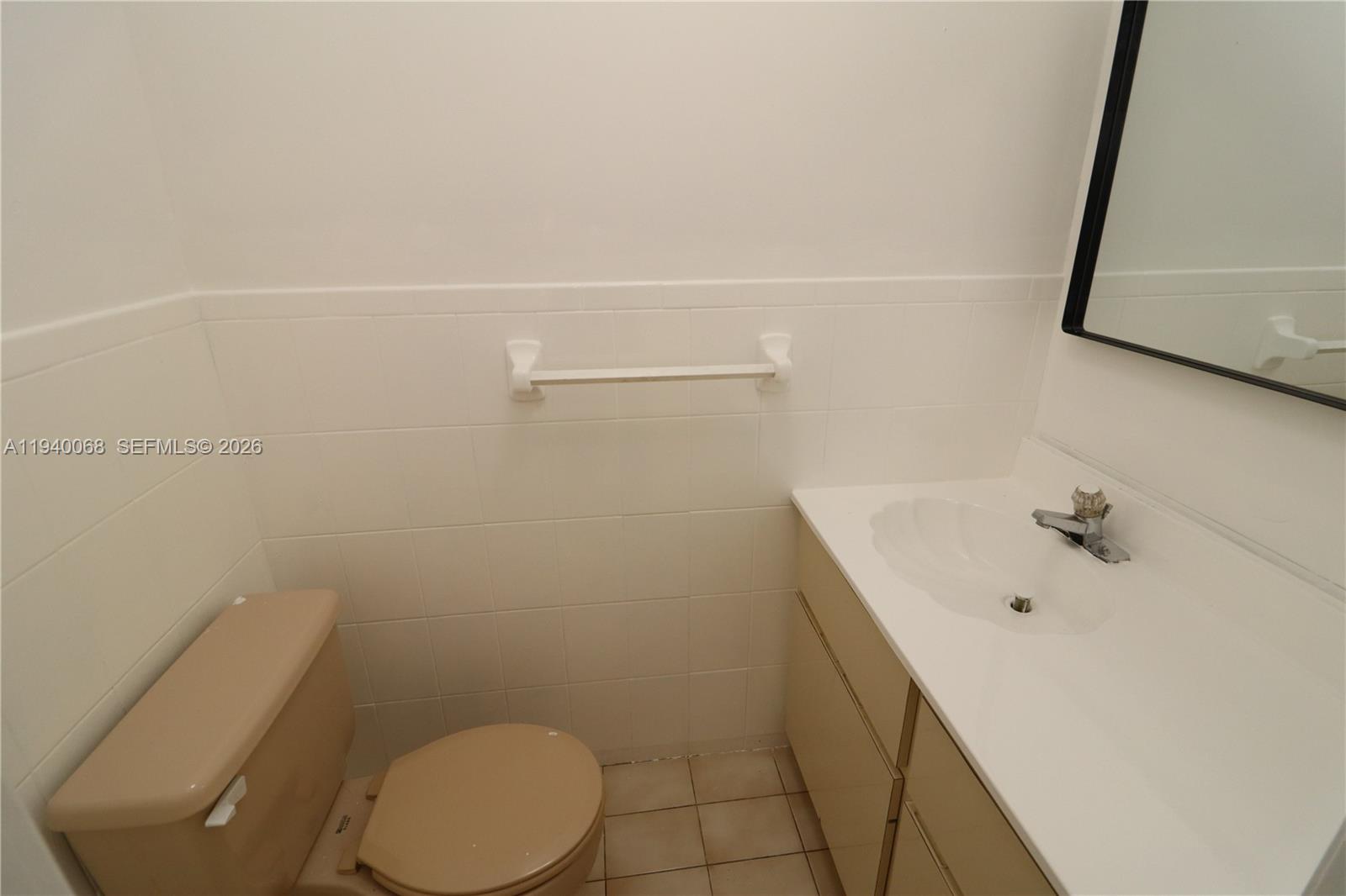 1348 Southwest 2nd Street, Unit 8 Miami, FL 33135 - Photo 30 of 37 a bathroom with a sink a toilet and shower
