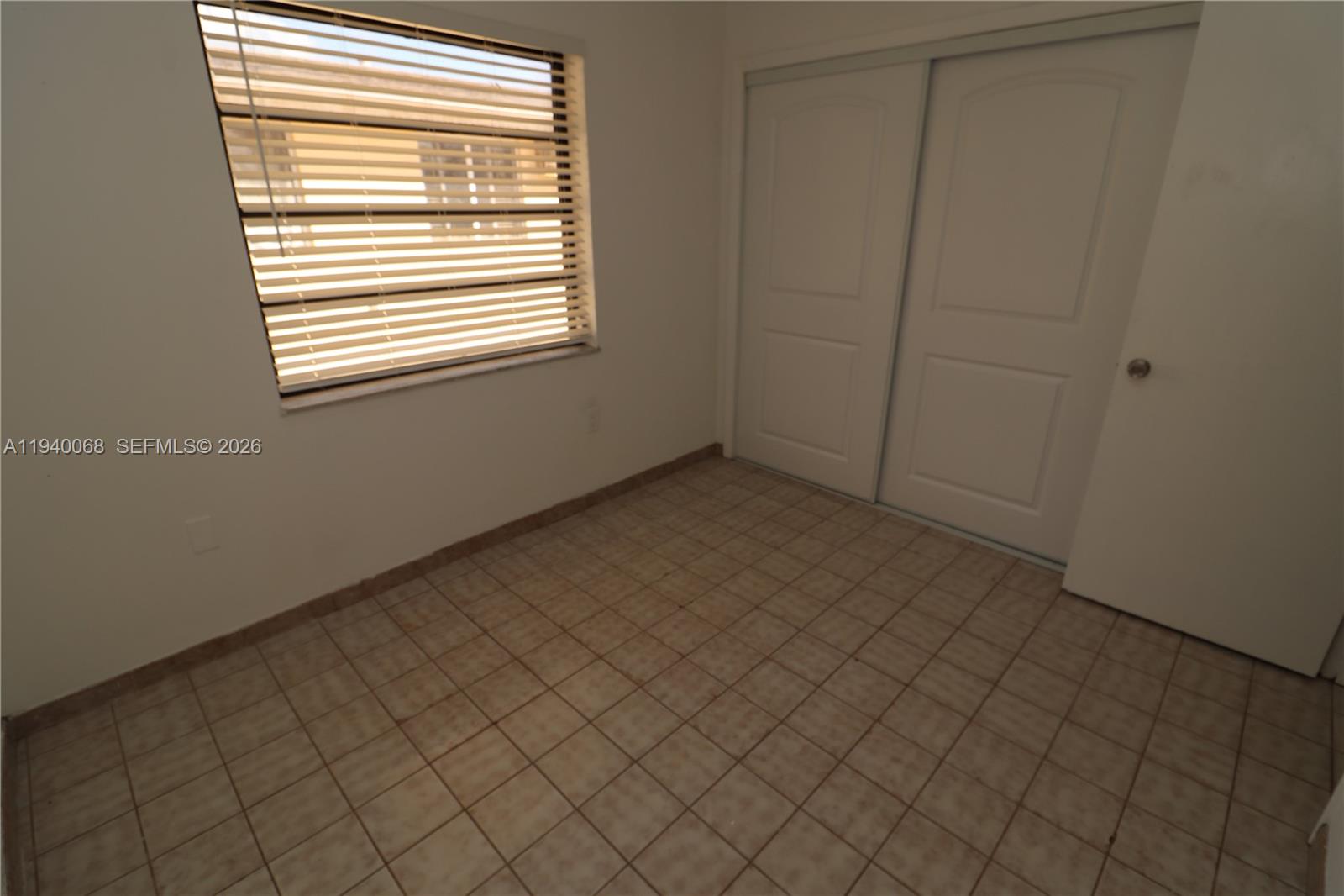 1348 Southwest 2nd Street, Unit 8 Miami, FL 33135 - Photo 32 of 37 an empty room with windows