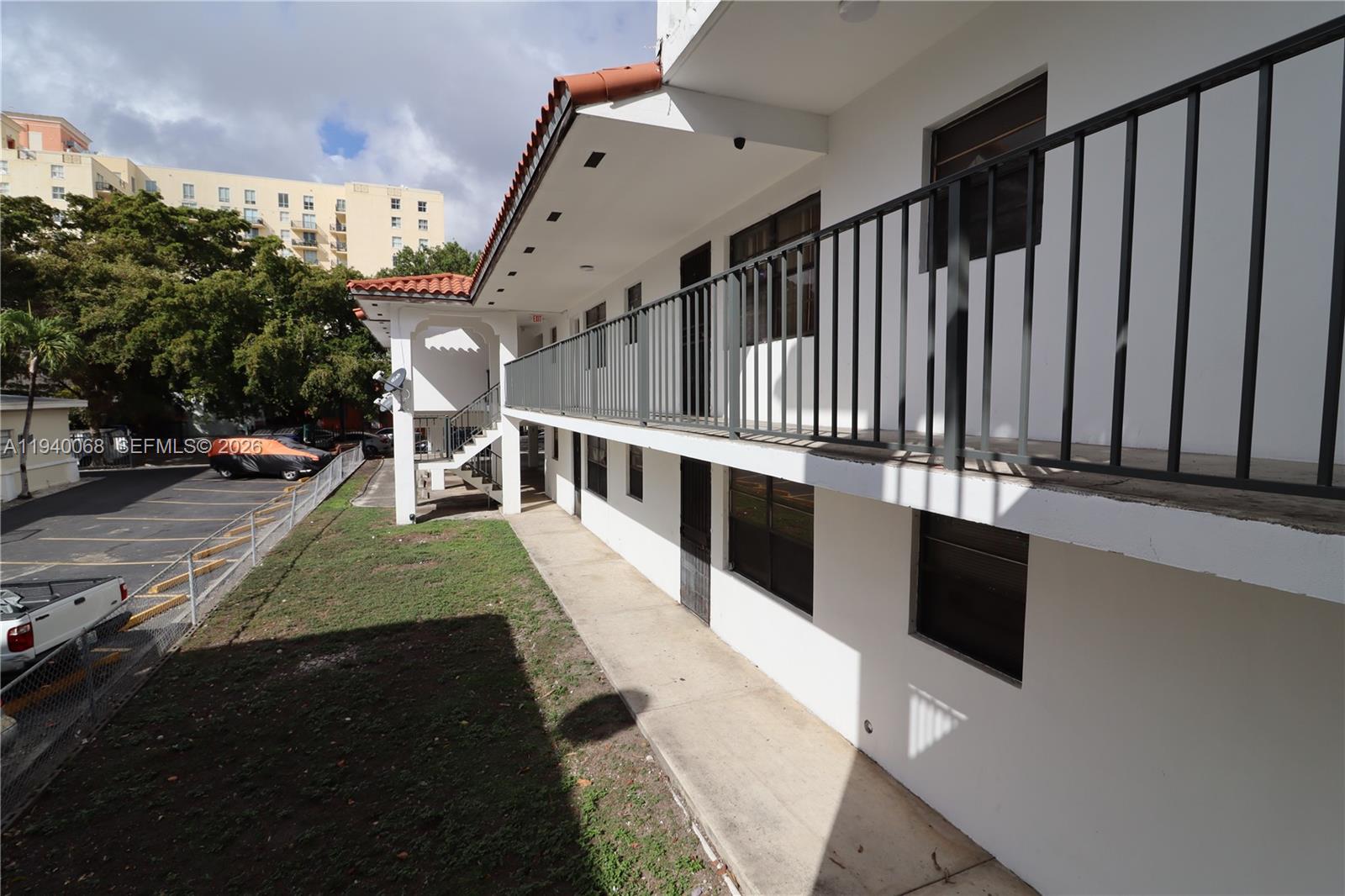 1348 Southwest 2nd Street, Unit 8 Miami, FL 33135 - Photo 37 of 37 a view of entryway and hall with wooden floor