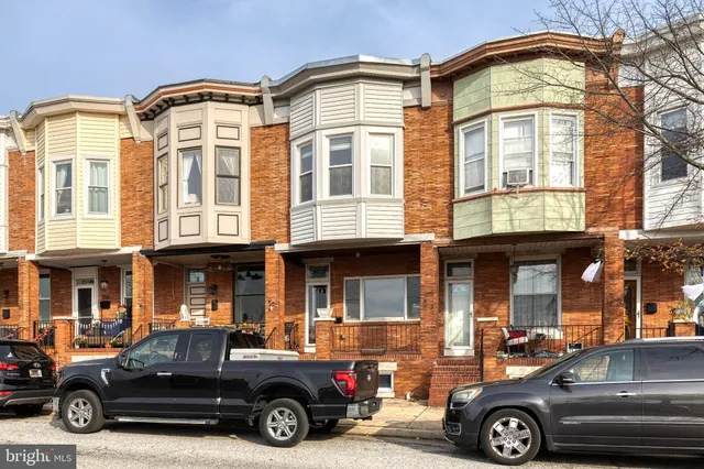 a car parked in front of a building