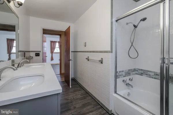a bathroom with a sink and a toilet