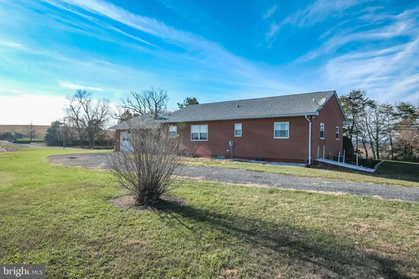 a house view with a lake