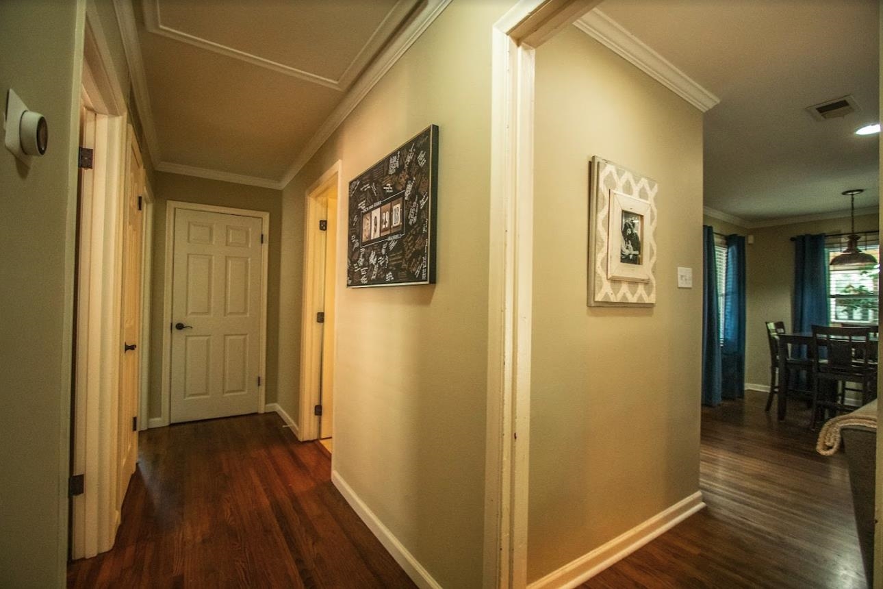 4964 Flamingo Road Memphis, TN 38117 - Photo 13 of 18 a view of a hallway with wooden floor