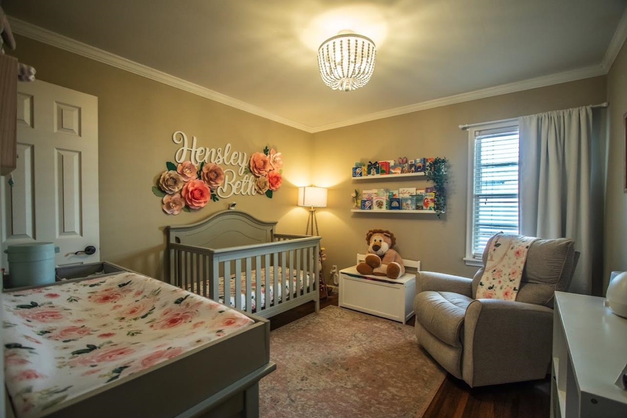 4964 Flamingo Road Memphis, TN 38117 - Photo 14 of 18 a bedroom with furniture and a window