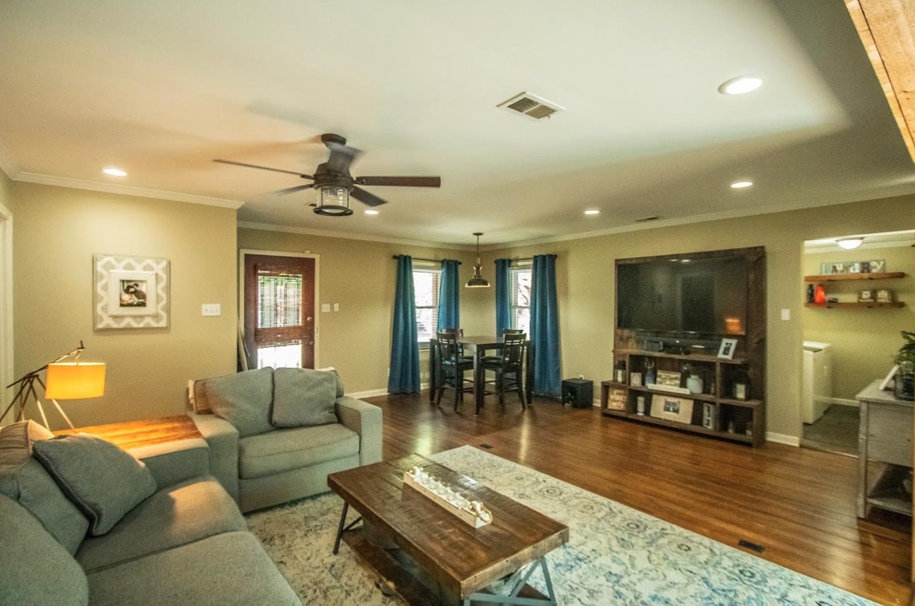 4964 Flamingo Road Memphis, TN 38117 - Photo 7 of 18 a living room with furniture and wooden floor