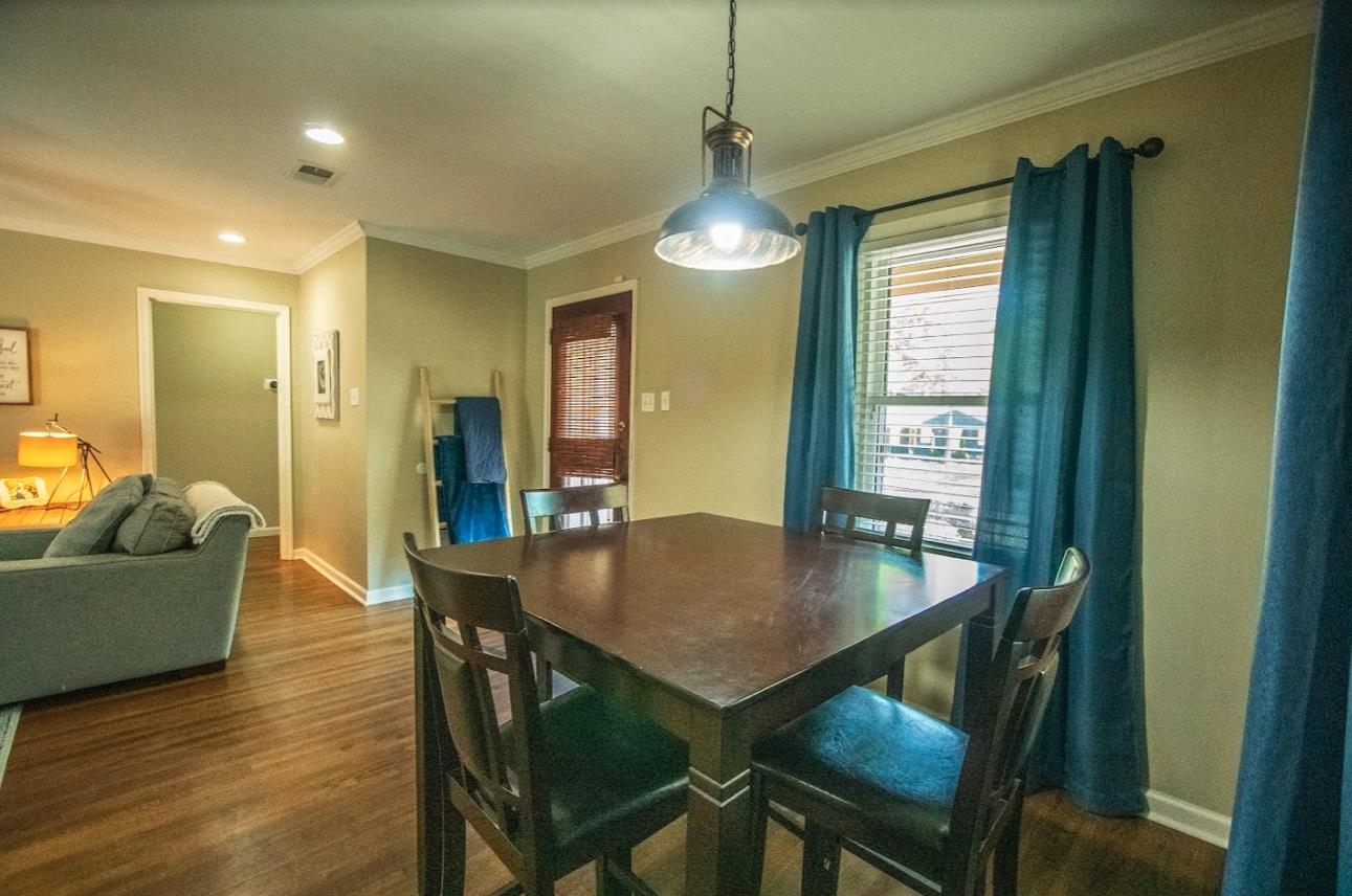 4964 Flamingo Road Memphis, TN 38117 - Photo 10 of 18 a view of a dining room with furniture and window