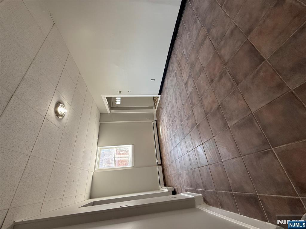 75 Lodi Street Hackensack, NJ 07601 - Photo 8 of 11 a view of a livingroom with a window