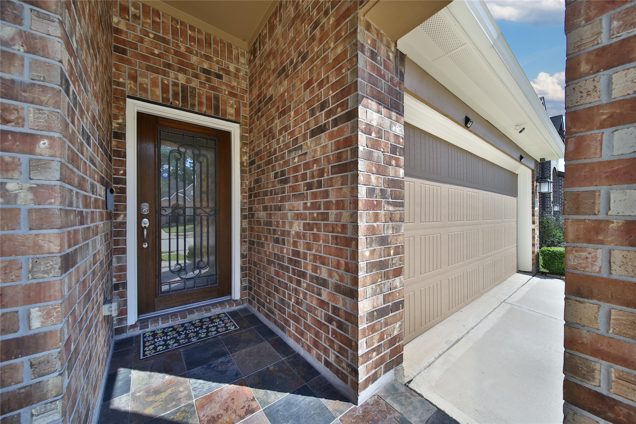 214 Pleasant Hill Way Conroe, TX 77304 - Photo 5 of 43 The front porch is spacious and welcoming with space for a bench or seating area to enjoy your cul de sac street.