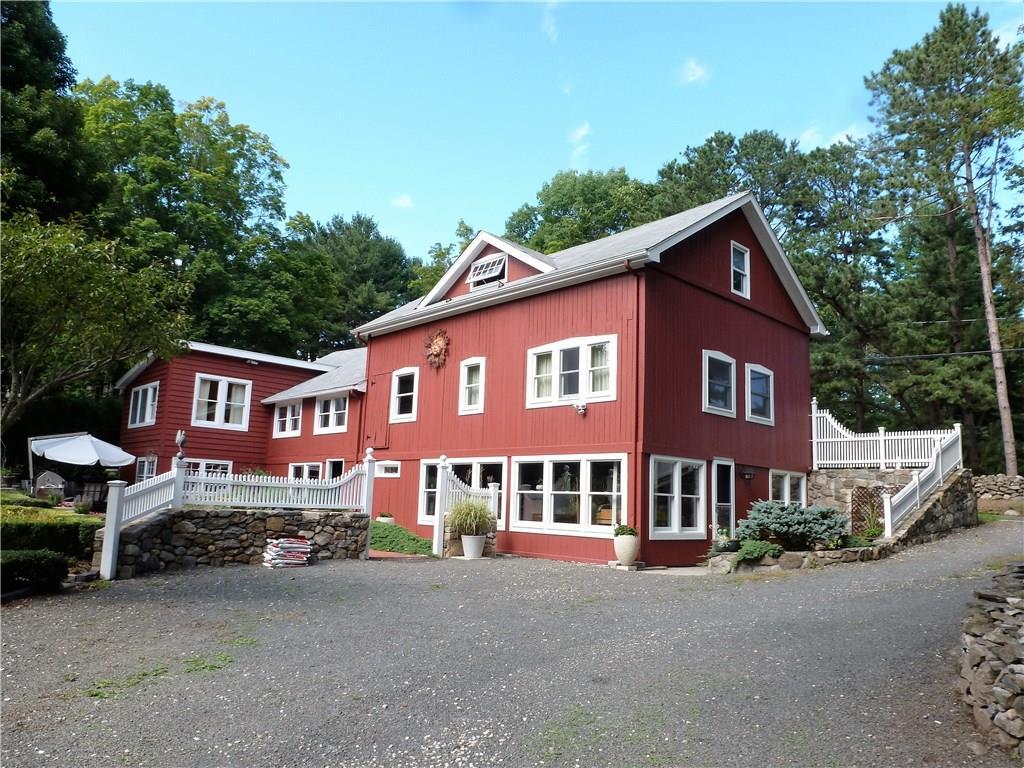 26 Obtuse Road South Brookfield, CT 06804 - Photo 1 of 1 a front view of a house with a yard