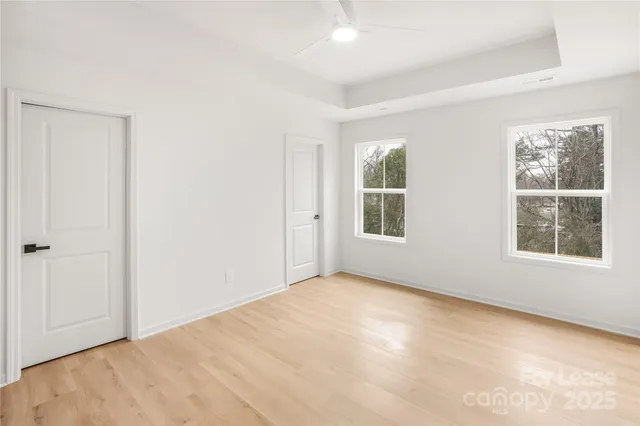 a kitchen with a sink a stove and cabinets