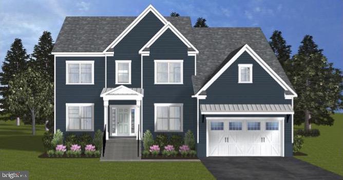 a front view of house a yard and green space