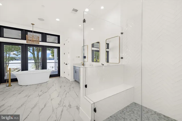 a large white room with wooden floor