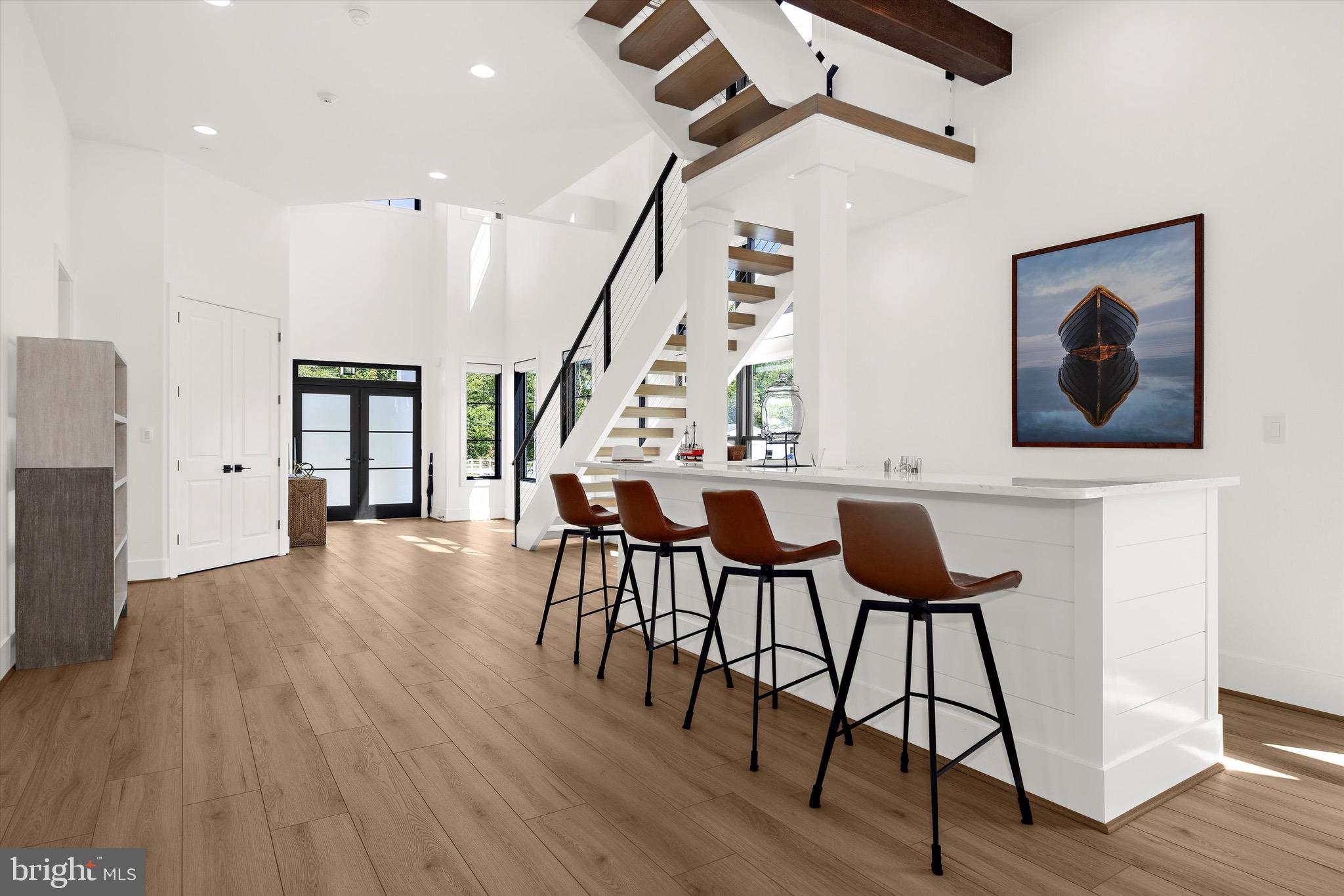 12618 Newgate Road Rockville, MD 20850 - Photo 20 of 33 Examples of work - modernist stairway, bar.