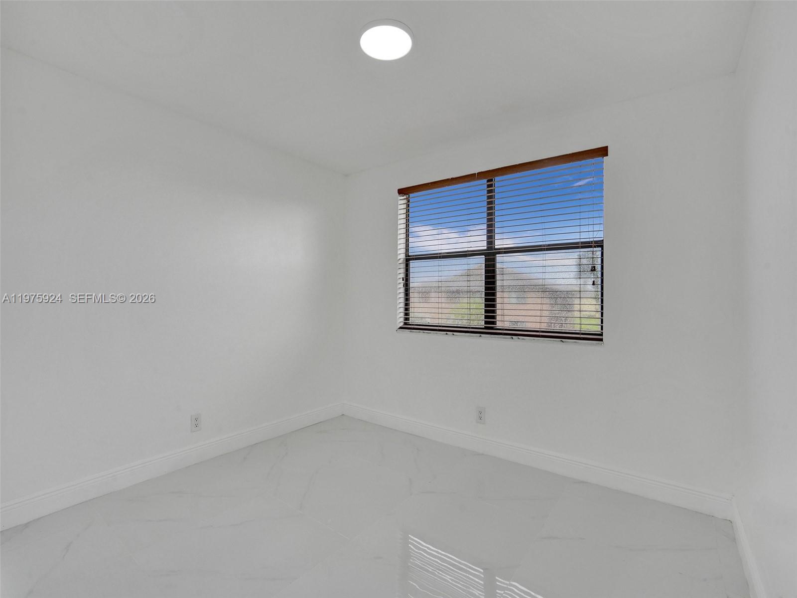 10051 Winding Lake Road, Unit 201 Sunrise, FL 33351 - Photo 13 of 24