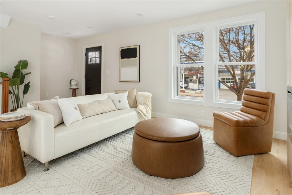 157 Boston Avenue, Unit 1 Somerville, MA 02144 - Photo 5 of 40 a living room with furniture and a window