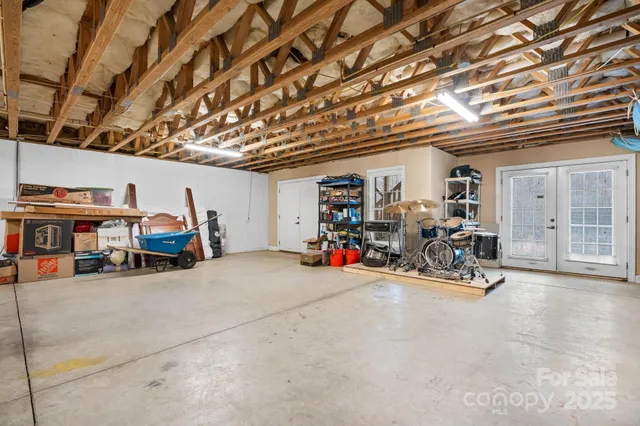 a view of a garage with gym equipment