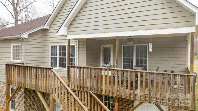 a view of a brick house with a large window