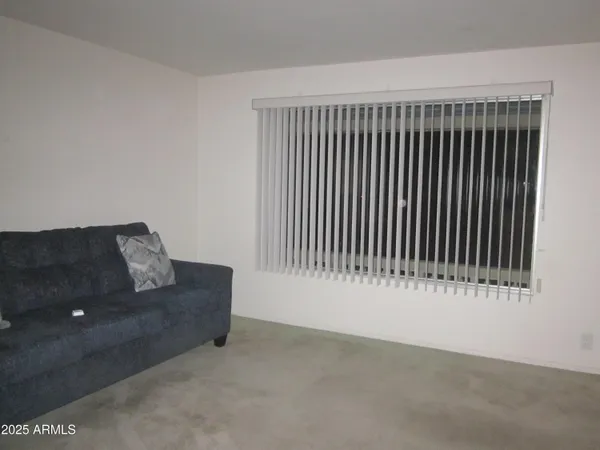 a view of a livingroom with a couch