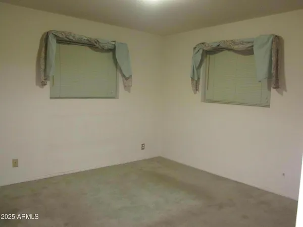 a view of a golf course with a park