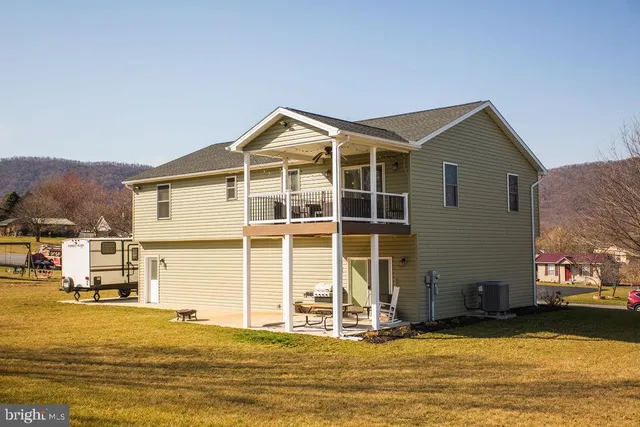 a view of a house with a ocean view