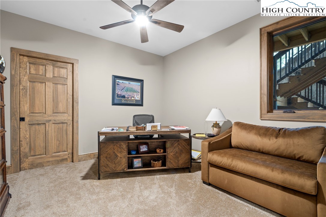 396 Summit View Parkway, Unit S1221 Boone, NC 28607 - Photo 15 of 37 a living room with furniture and a ceiling fan