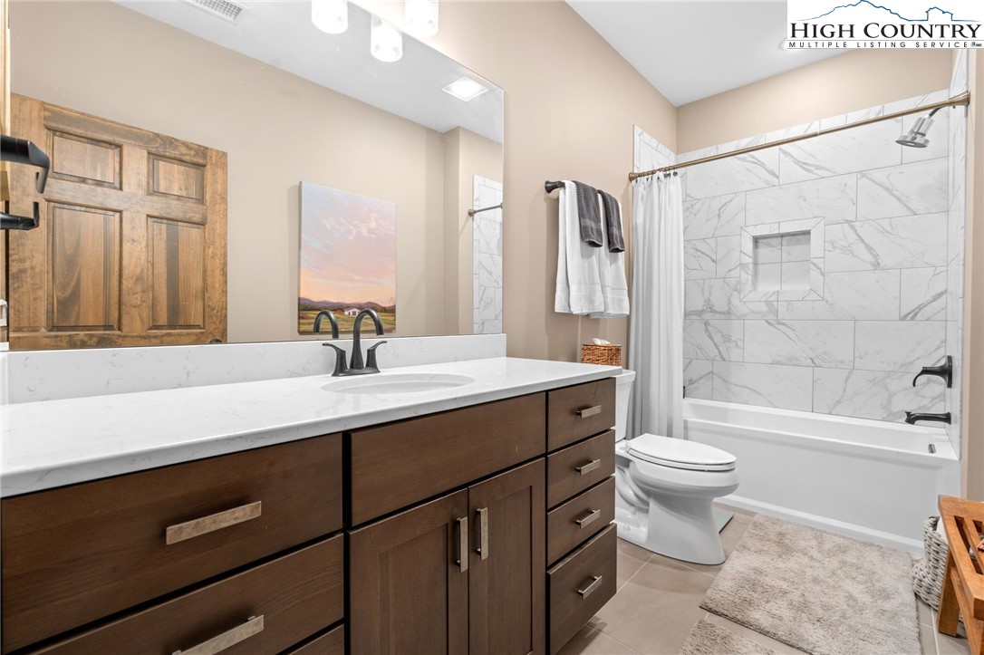 396 Summit View Parkway, Unit S1221 Boone, NC 28607 - Photo 23 of 37 a bathroom with a sink a toilet and shower