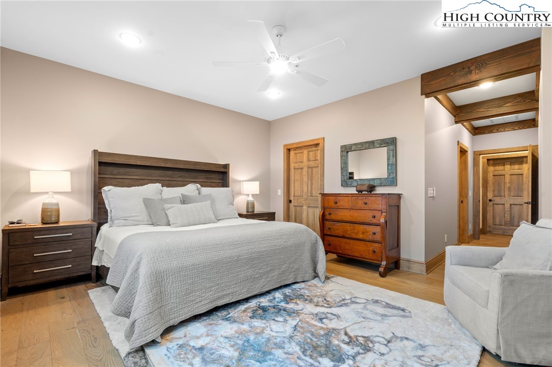 396 Summit View Parkway, Unit S1221 Boone, NC 28607 - Photo 26 of 37 a bedroom with a bed and furniture