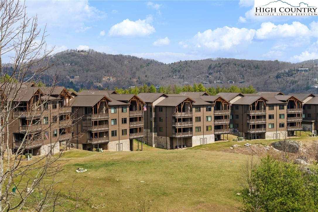 396 Summit View Parkway, Unit S1221 Boone, NC 28607 - Photo 30 of 37 a view of a large building with a mountain view