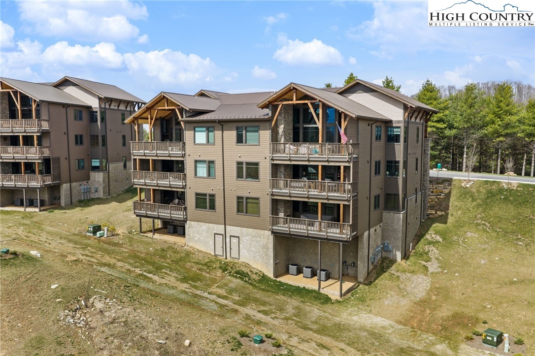 396 Summit View Parkway, Unit S1221 Boone, NC 28607 - Photo 35 of 37 a view of residential houses with city street