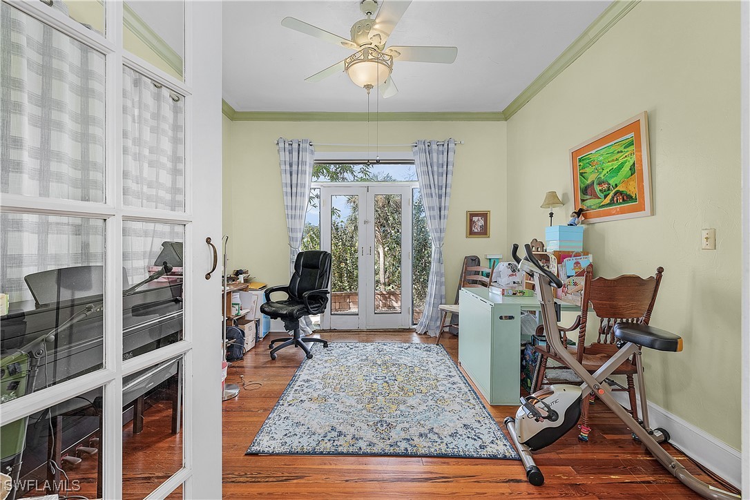 13841-13845 Robert Road Bokeelia, FL 33922 - Photo 17 of 50 a living room with furniture and a floor to ceiling window