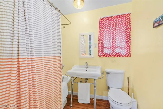 a bathroom with a sink and a toilet