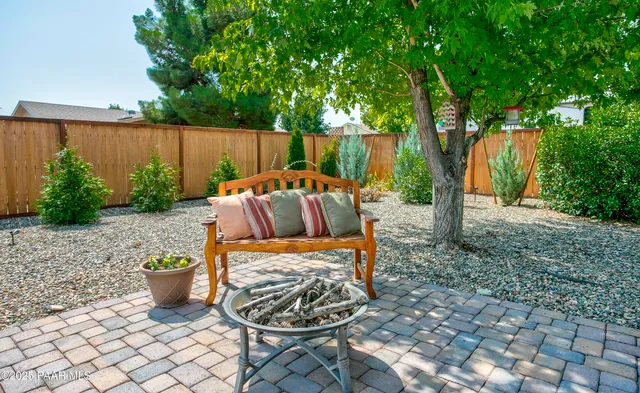 a view of outdoor kitchen and patio