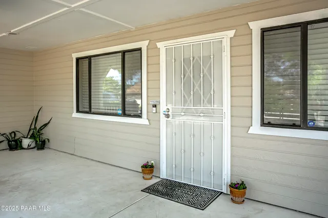 a view of empty room with windows