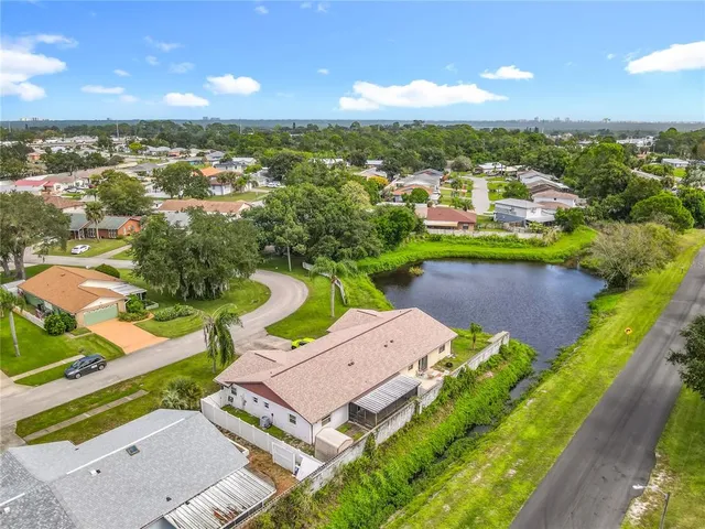 an aerial view of a house with a garden