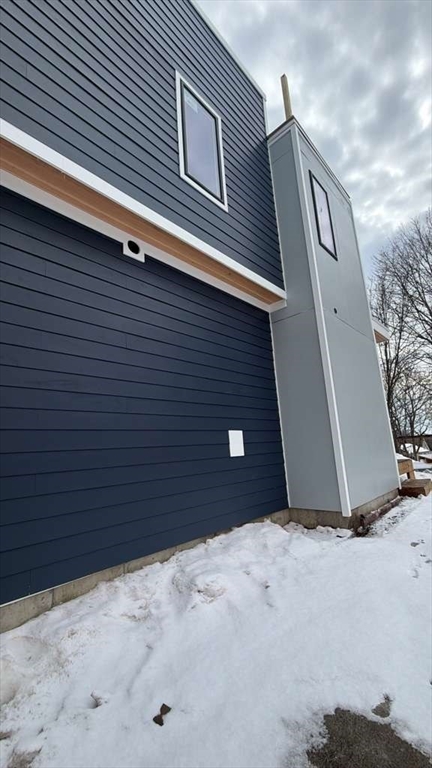 96 Burpee Road, Unit 1 Swampscott, MA 01907 - Photo 3 of 17 a view of a garage
