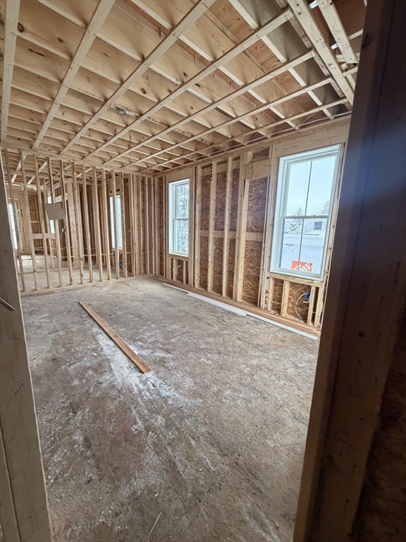 96 Burpee Road, Unit 1 Swampscott, MA 01907 - Photo 4 of 17 a view of a room with wooden walls