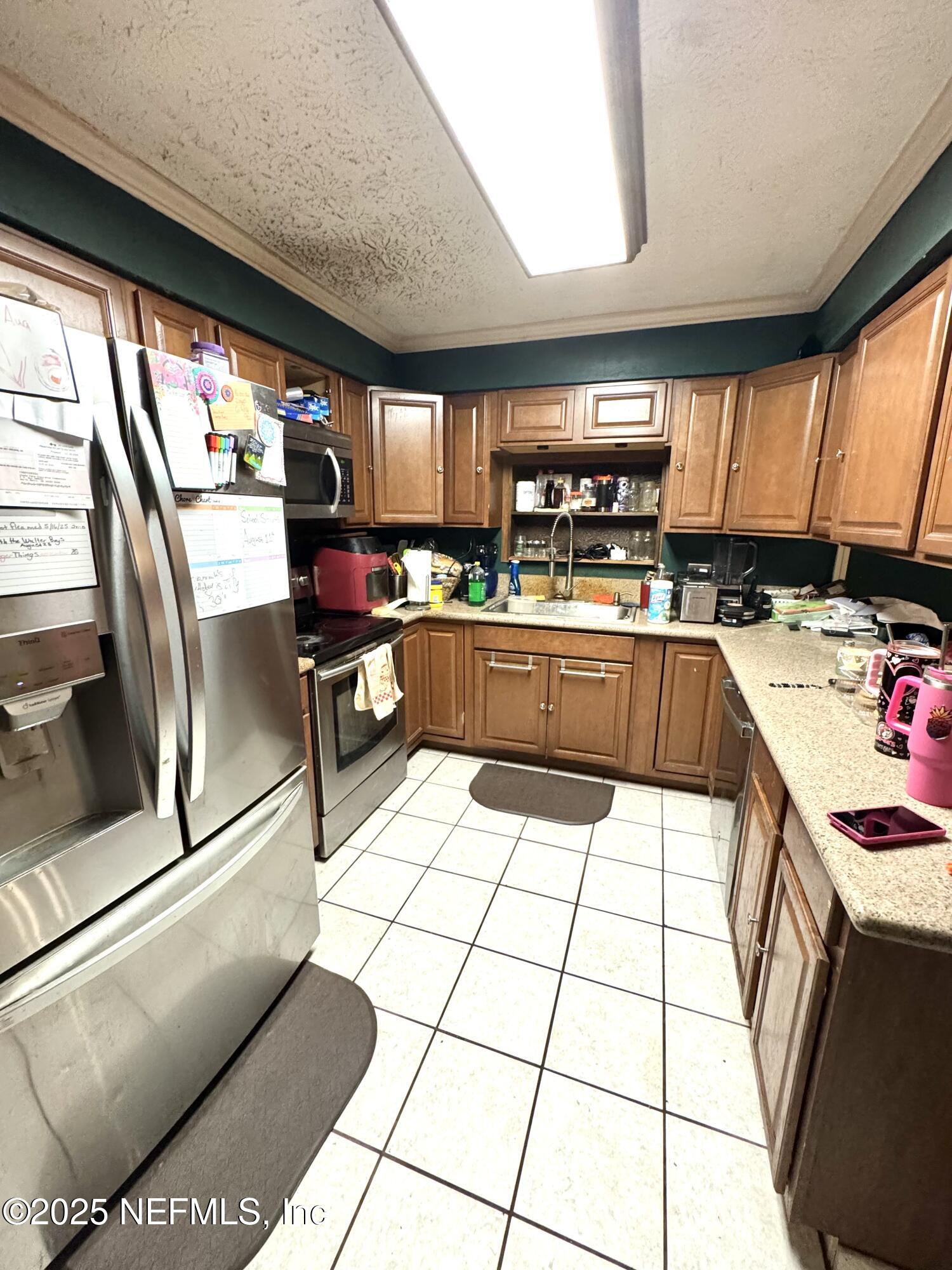 13552 Lanier Road Jacksonville, FL 32226 - Photo 5 of 16 FullSizeRender