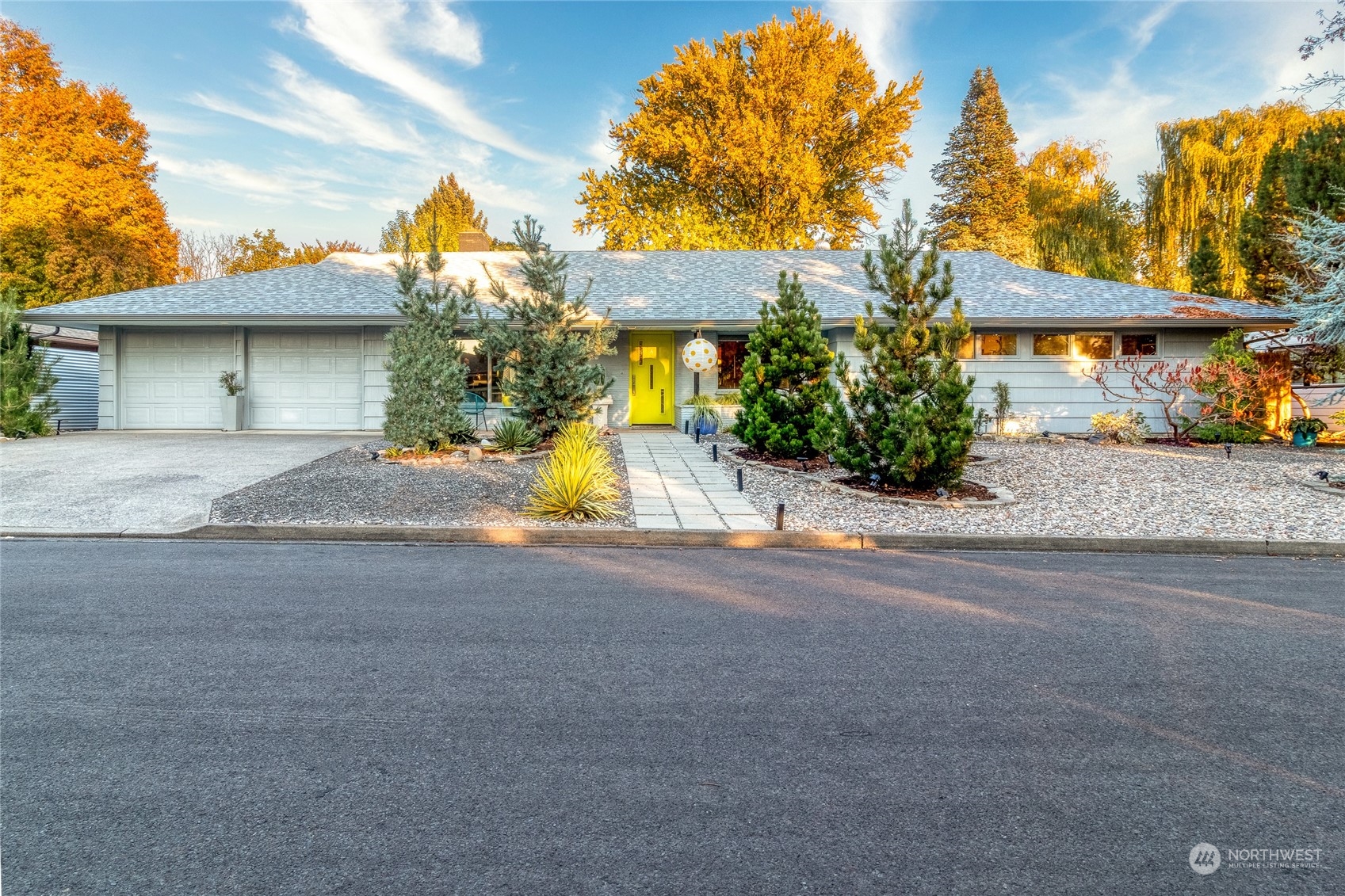1739 Center Street Walla Walla, WA 99362 - Photo 1 of 40 a front view of a house with a yard and a garage