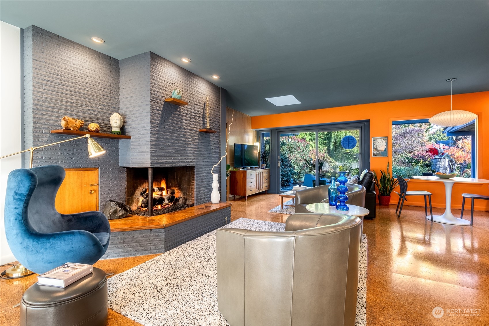 1739 Center Street Walla Walla, WA 99362 - Photo 6 of 40 a living room with furniture a fireplace and a floor to ceiling window