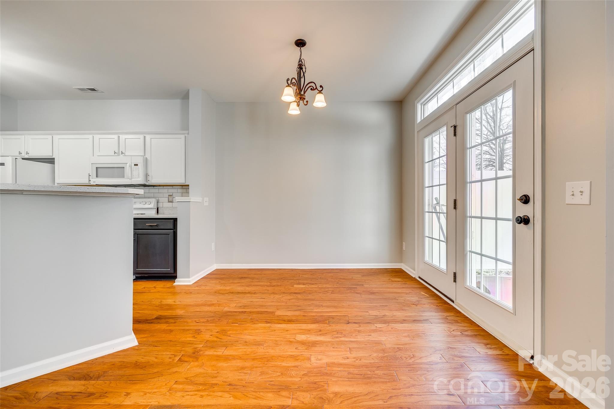 618 Bayou Circle Clover, SC 29710 - Photo 13 of 31 a view of empty room with wooden floor and fan